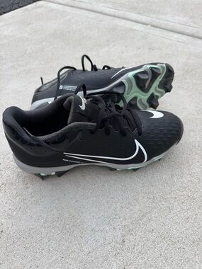 Nike Black Cleats with White Swoosh and Teal Accents